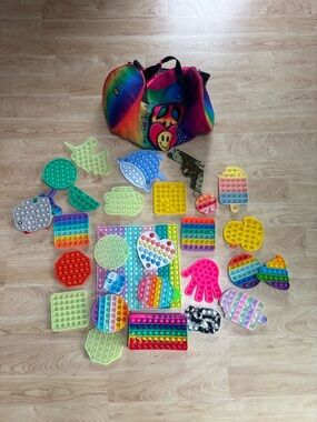 Duffel Bag with 28 Pop it Fidget Toys - plus bonus bag of sensory toys